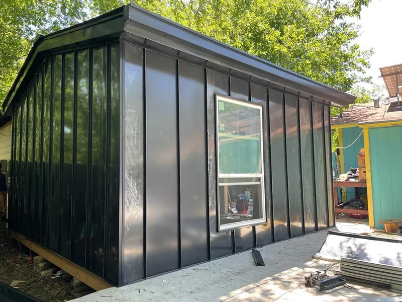 Black standing seam metal wall panels for Roof Inspection in Oak Harbor