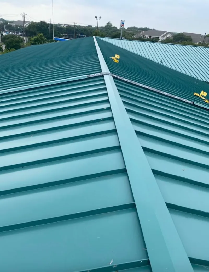 Green commercial metal roof ridge and valley for Metal Roof Repair in Oak Harbor